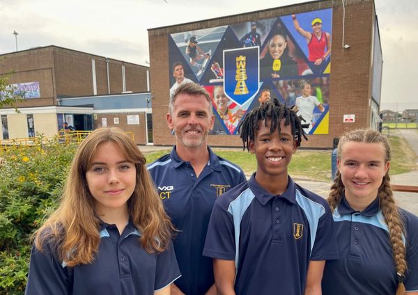 Student sporting stars unveil 30-foot wonder wall of inspiration