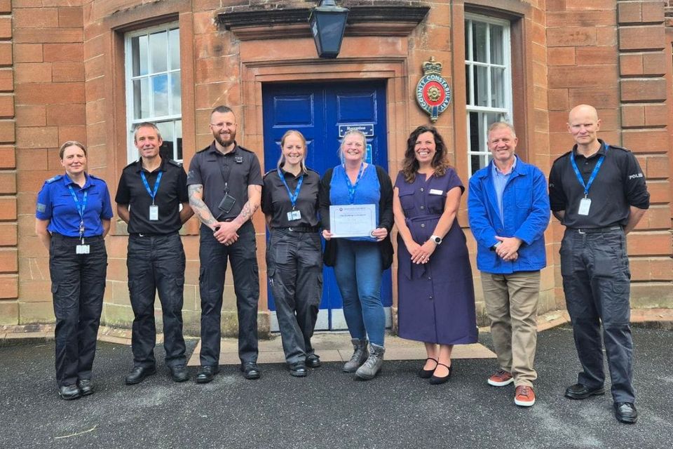 PC Sam O’Key Receives First-Ever Challenge Coin from Naturewatch Foundation