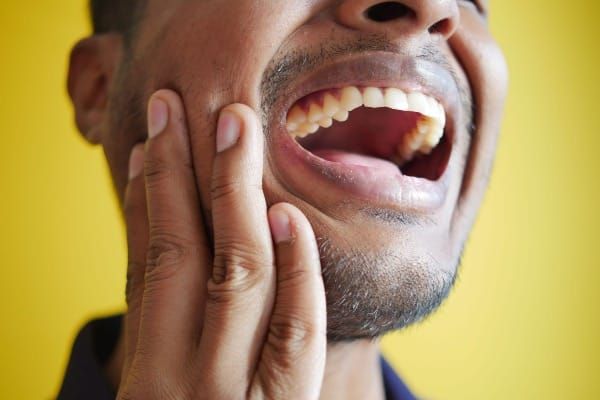 Mouth microbes could help detect stomach and bowel cancers, study suggests