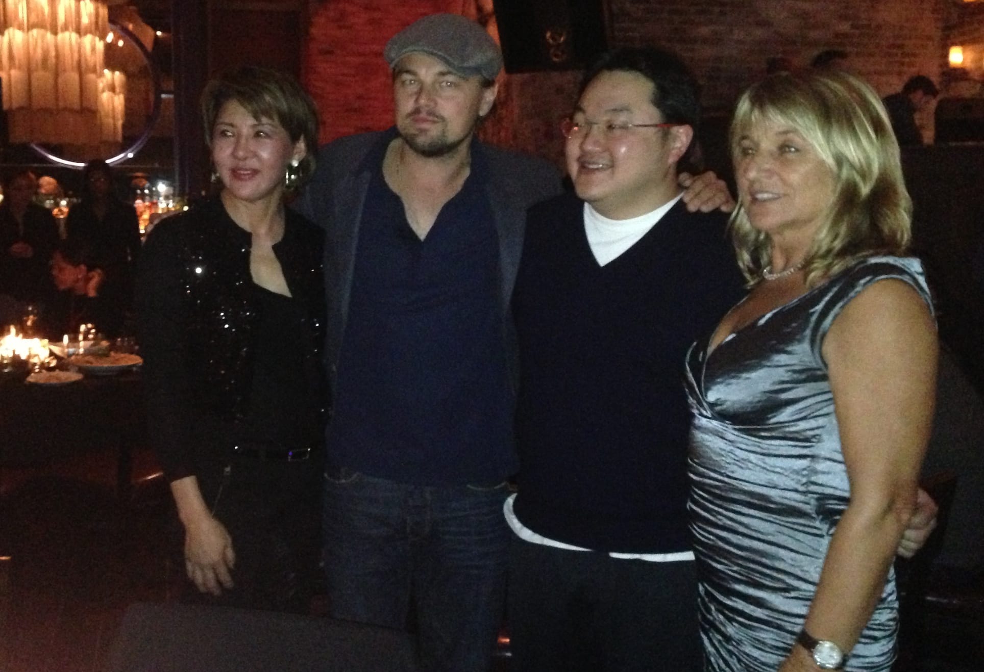 Jho Low with Leonardo DiCaprio at a nightclub.
