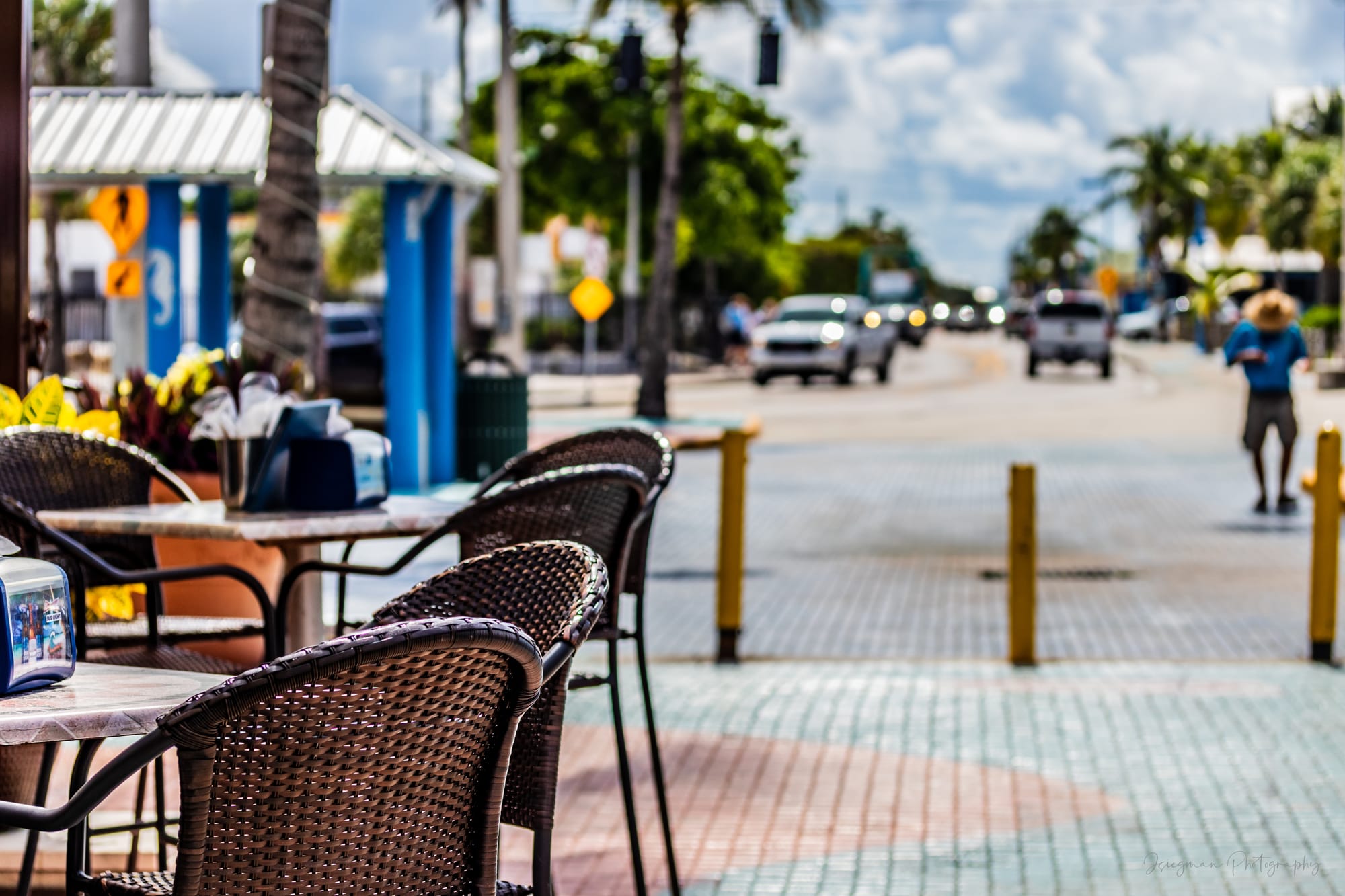 Florida restaurant Miami with tables and guests wandering in the background.