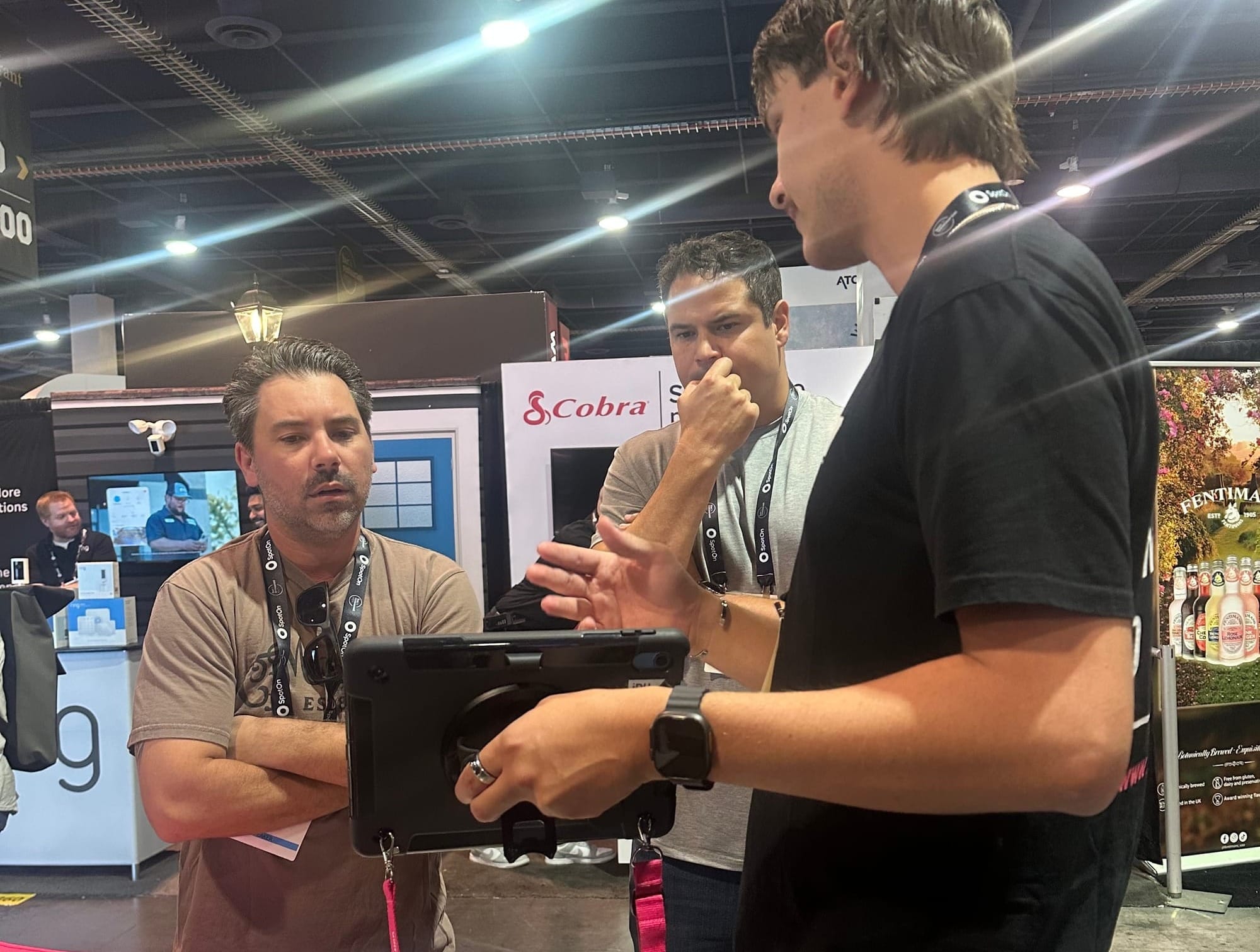 Bryan Solar (center) watching a tech demo at Bar & Restaurant Expo 2025