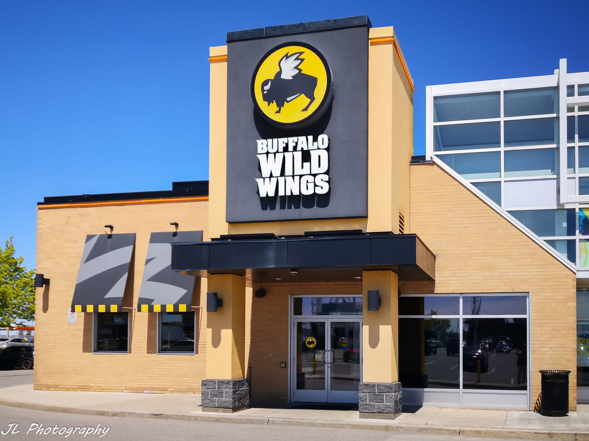 Exterior of a Buffalo Wild Wings restaurant in Oakville, Ontario