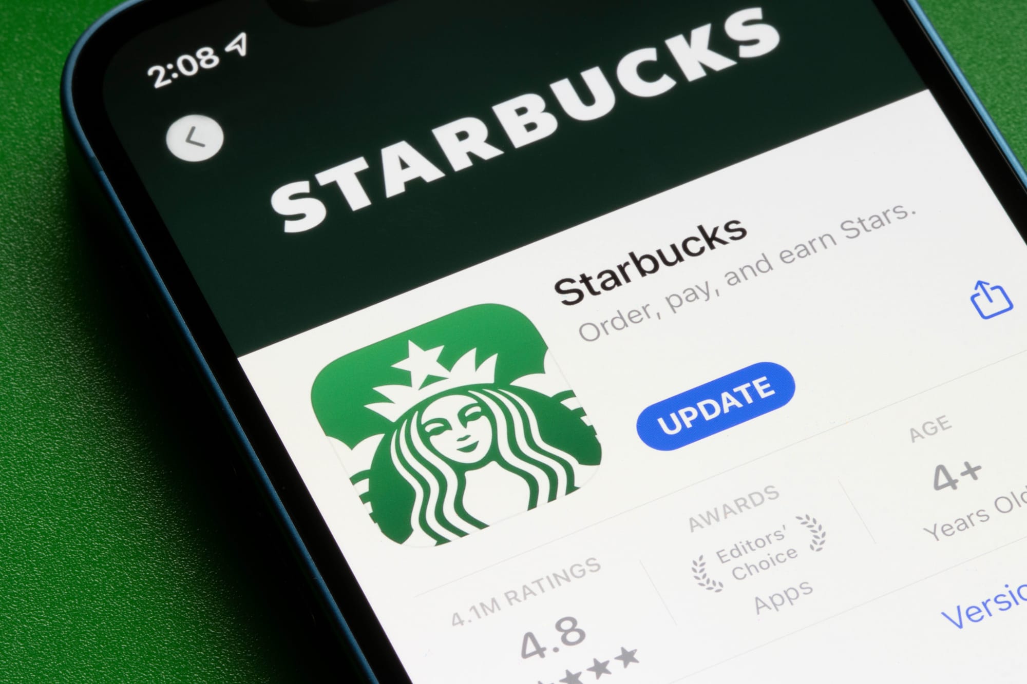 Starbucks mobile app shown in the App Store, used to manage Starbucks Rewards program.