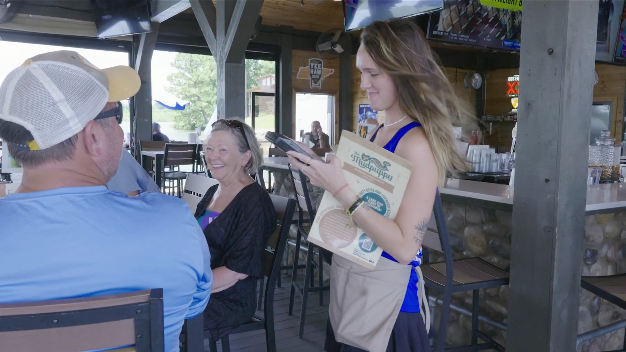 Server taking beverage orders.