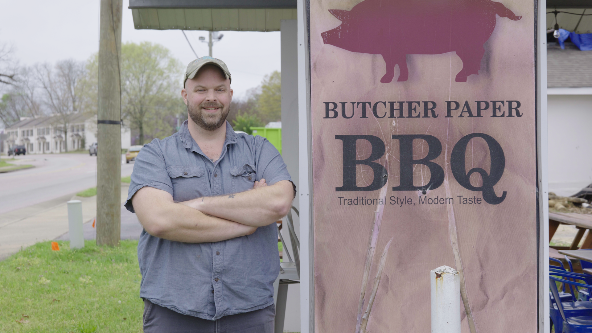 Mark Coxwell, owner of Butcher Paper BBQ, standing in front of his restaurant