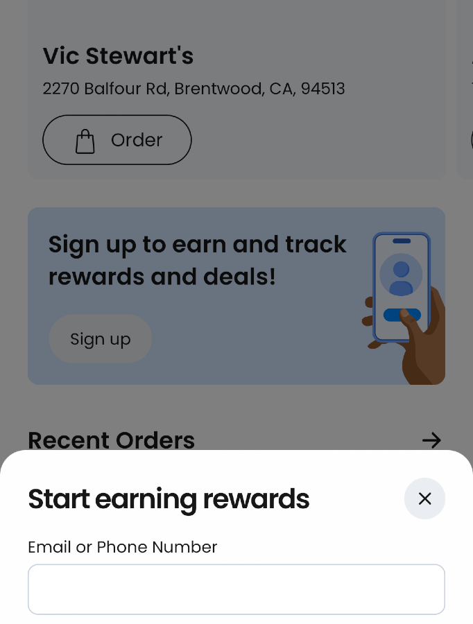 Mobile app sign-up screen for a restaurant loyalty program, with an email or phone number field.