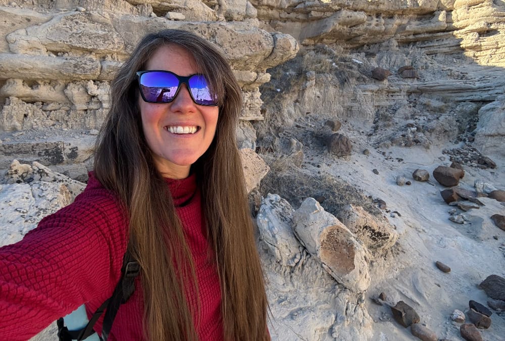 the squak grid fleece hoodie in the southwest high desert on a hiker