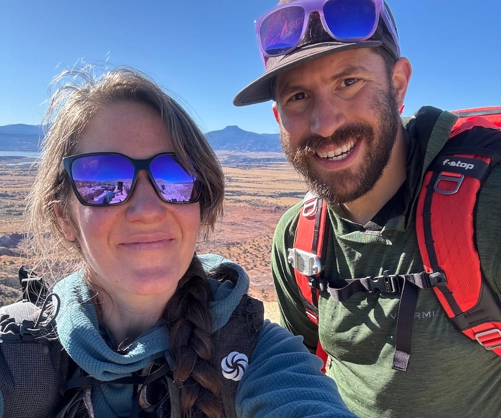 Bajio sunglasses worn by a man and a woman for hiking in the cold