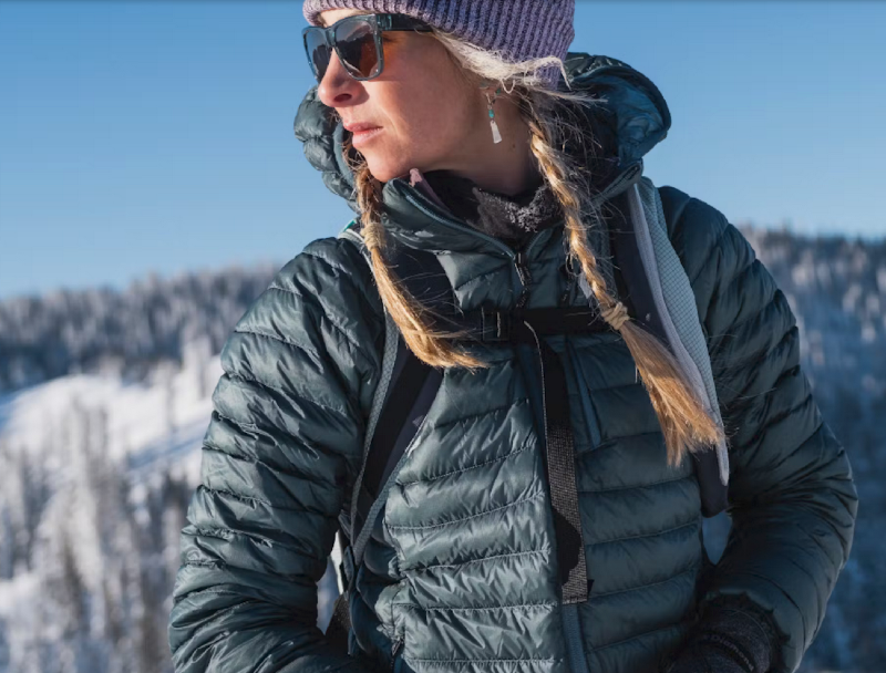 a hiker in the mountains wears the approach down hoody by black diamond to stay warm in freezing conditions in 2025
