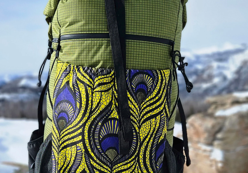 one of the best custom gear companies exotic pack co backpacks with mountains behind it this is a great backpack for camping and hiking and thru hiking