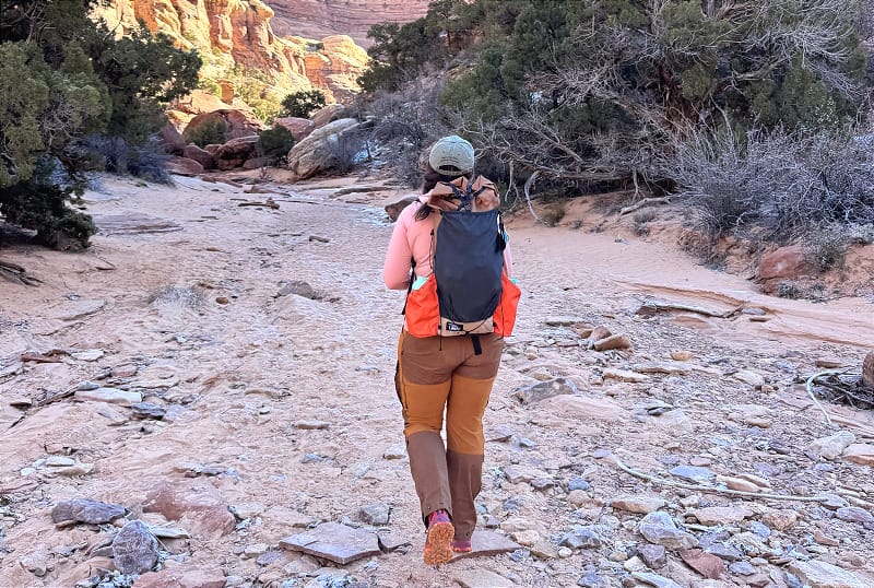 a hiker wears a custom liteaf backpack in utah