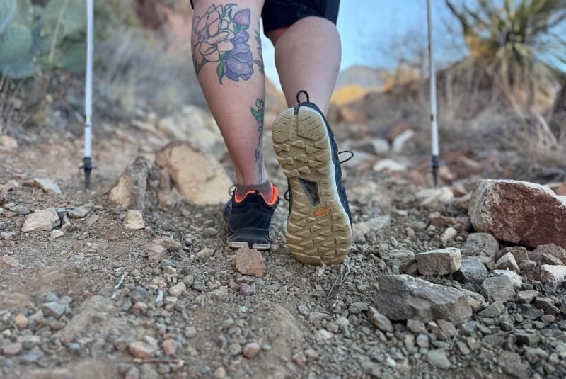 hiking on tricky terrain in the mountains with Alnasca Knit III Low GTX Shoes By Mammut
