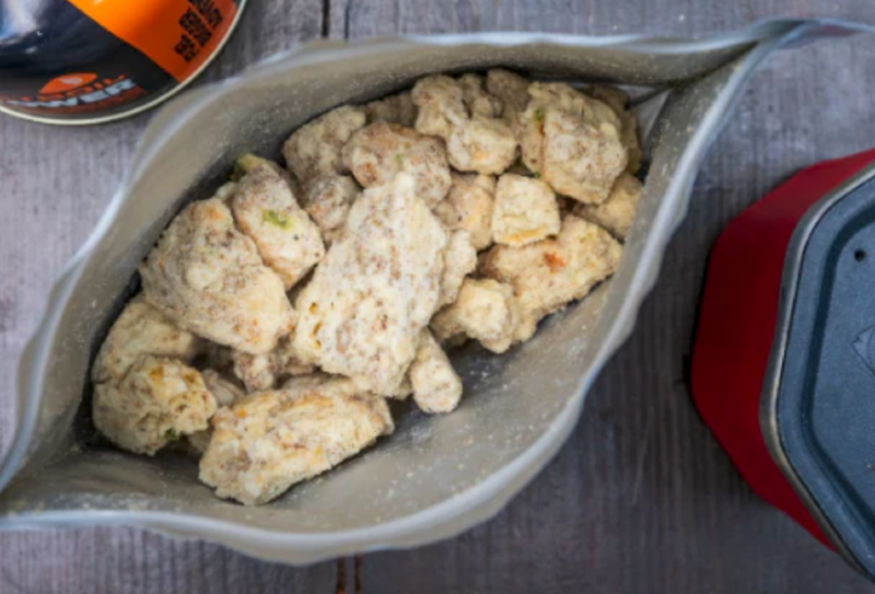 a peek inside the bag of Jalapeño Cheddar Biscuits & Herbed Sausage Gravy by Pinnacle Foods