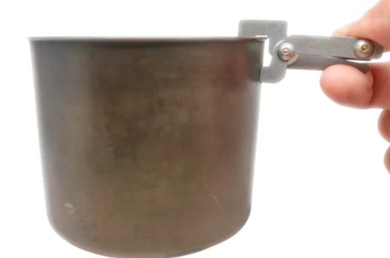 Close-up of the Suluk 46 titanium pot lifter, showcasing its lightweight and durable design for ultralight backpacking and camping cookware.