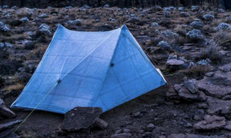 Zpacks Duplex tent pitched in a scenic evening landscape, showcasing its lightweight design and spacious interior for ultralight backpacking.