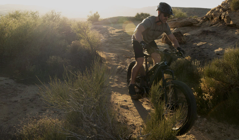 Sunset ride through desert scrub on a rugged Bakcou fat tire eBike