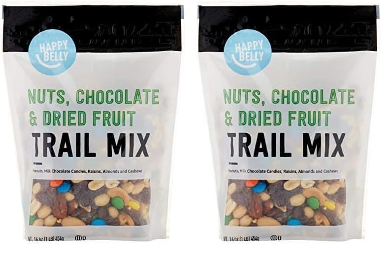 Two bags of Happy Belly Nuts, Chocolate & Dried Fruit Trail Mix with visible colorful ingredients.