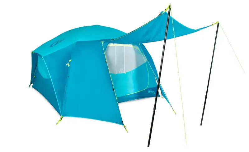 NEMO Aurora Highrise Camping Tent set up with extended rainfly awning supported by poles, showcasing full-coverage weather protection and ventilation.