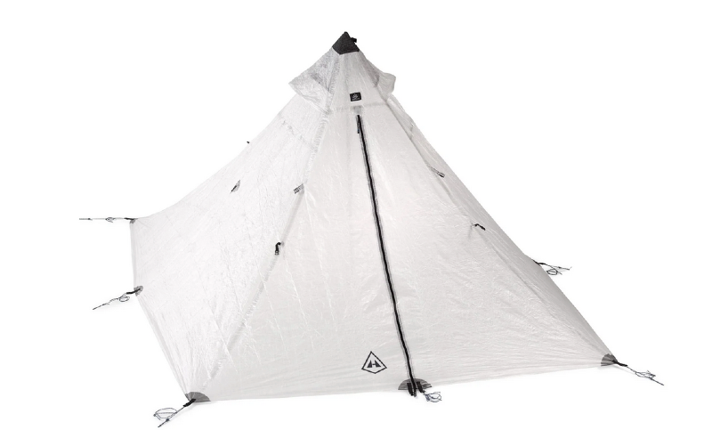 White Dyneema ultralight backpacking tent set up on plain background — high-end lightweight gear for serious backpackers.