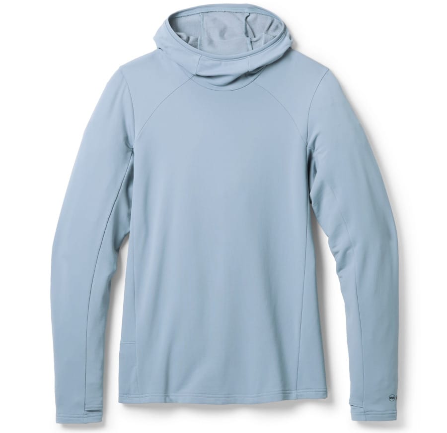 Light blue Janji Rover Merino Hoodie with long sleeves, raglan shoulder seams, and a streamlined pullover design.