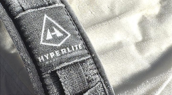 a hyperlite mountain gear backpack made from dyneema is coated in frost during a very cold backpacking trip in 2026 for the new year 