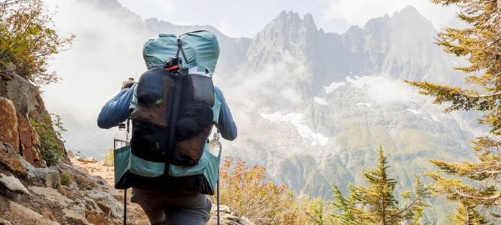 a hiker uses the shadowlight ultralight backpack now on sale through outdoor vitals in 2025
