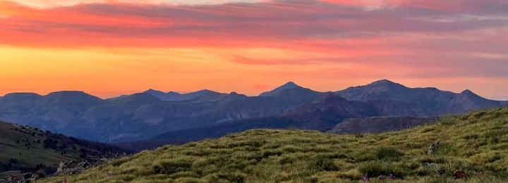Alpine mountain landscape at sunset in bear country where bear canisters like the Grubcan Wave are required for backpacking food storage