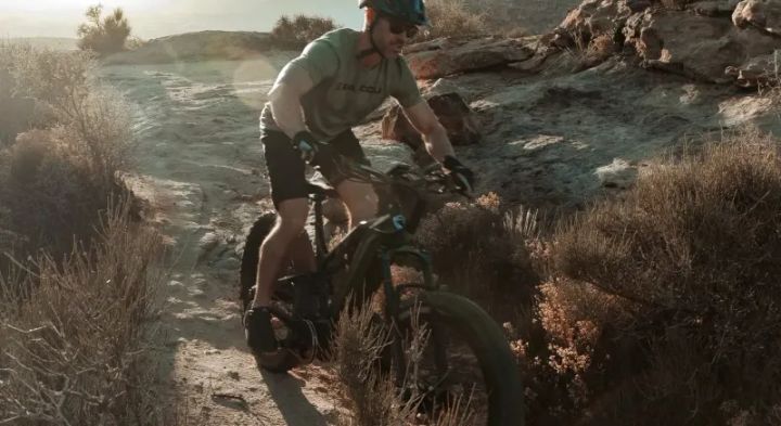 Rider on Bakcou Mule Jager eBike during 2026 sale, featuring 20 percent off Mule Jager and 15 percent off Scout eBikes for backcountry and trail riding.