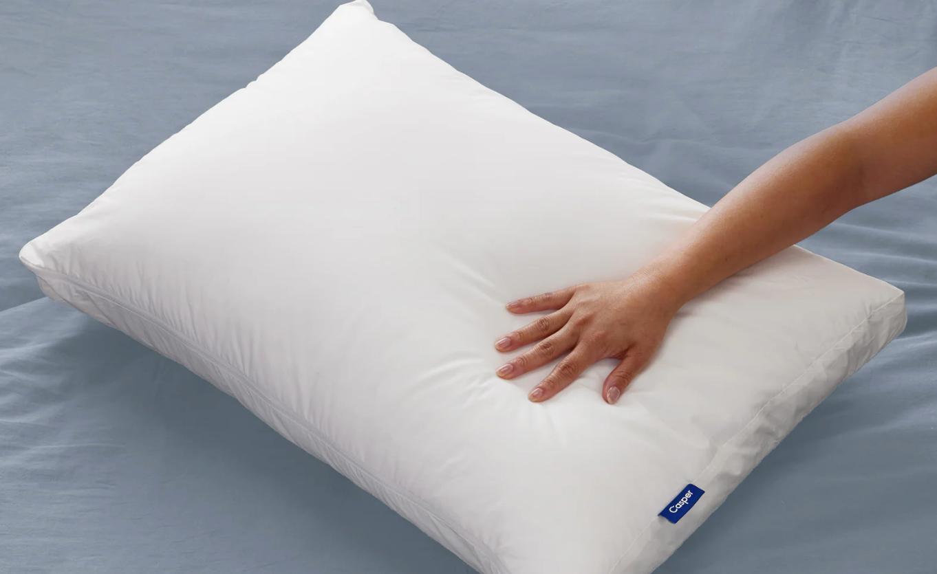 a hand touching a casper pillow in a way that may be vaguely sensual? am i reading too much into this?