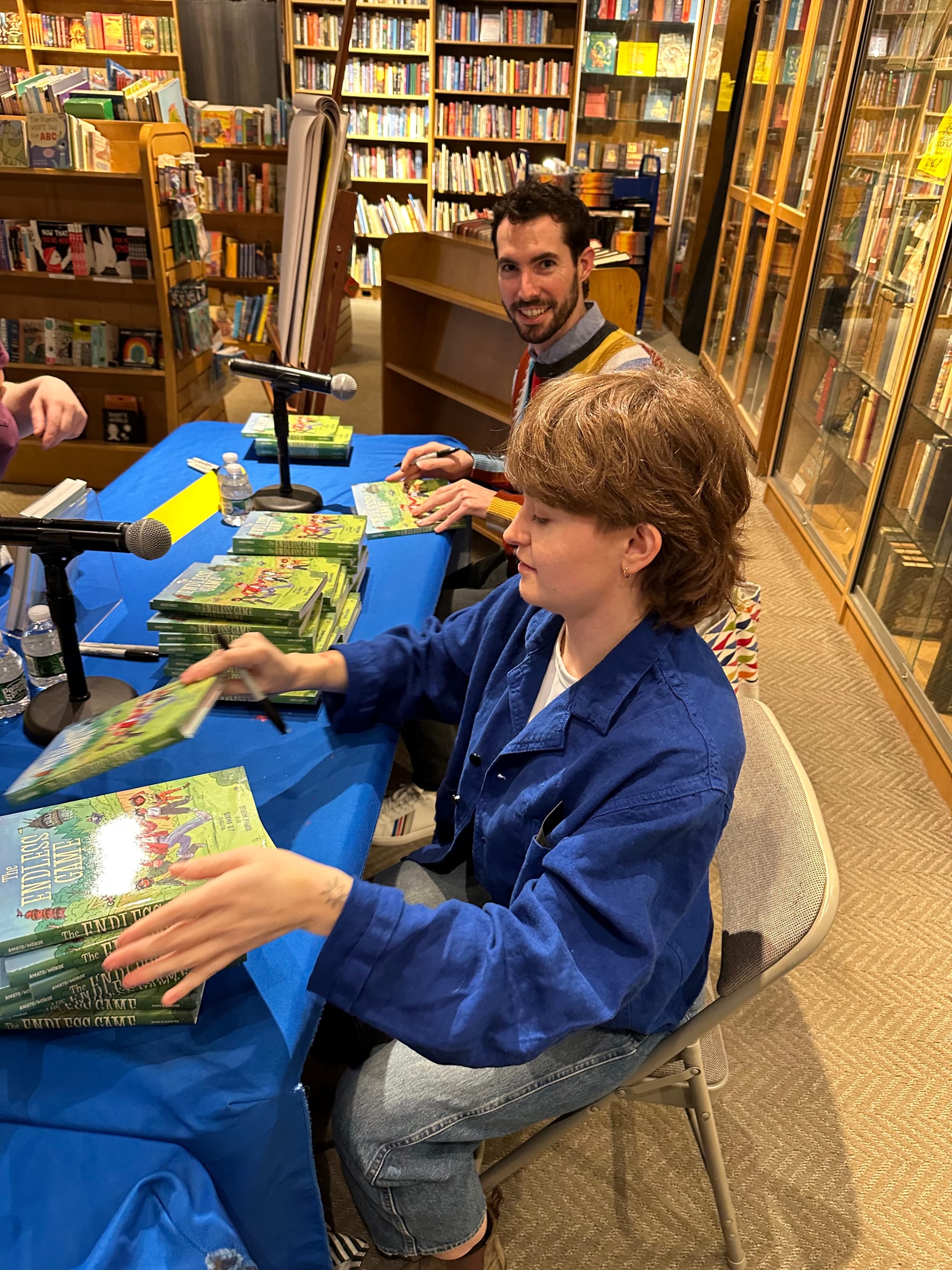 J.D. and Sophie signing books!