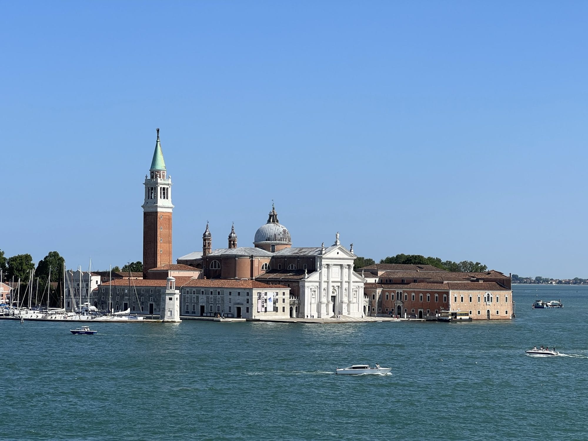 The island of San Giorgio Maggiore across the lagoon, with Palladio's white church and its brick campanile