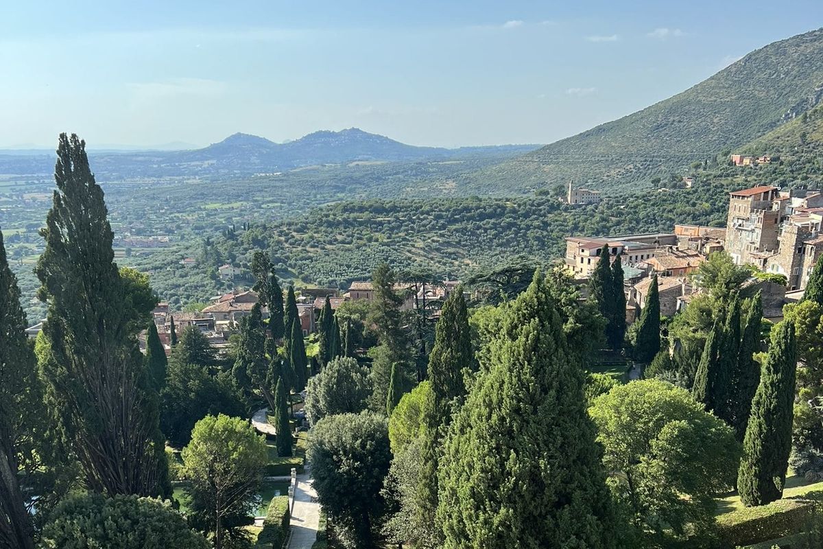 Villa d'Este, Tivoli, from the terrace: cypresses, the garden below, the roofs of the town and the plain towards Rome
