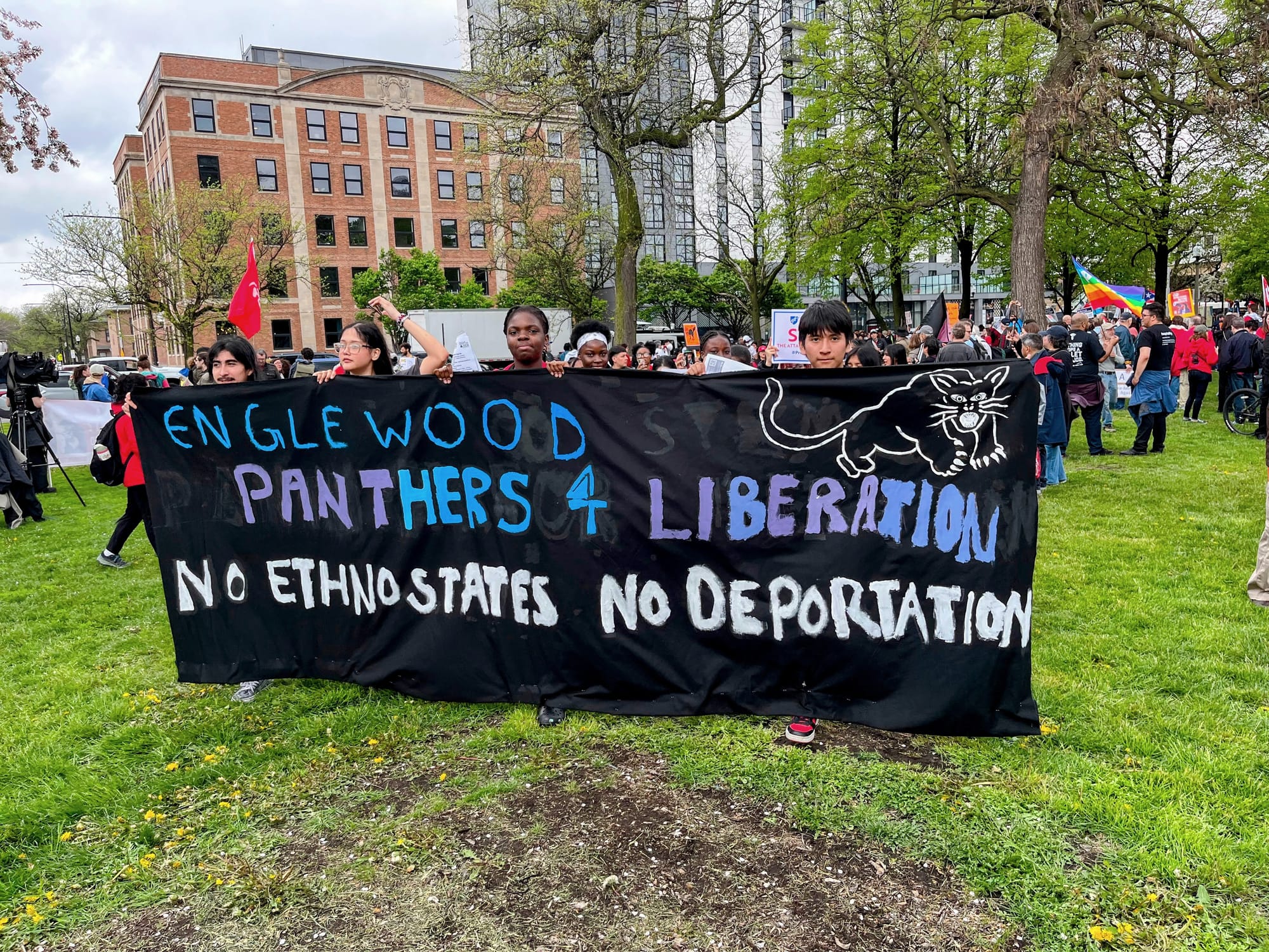 Students hold a banner that says "Englewood Panthers 4 Liberation."
