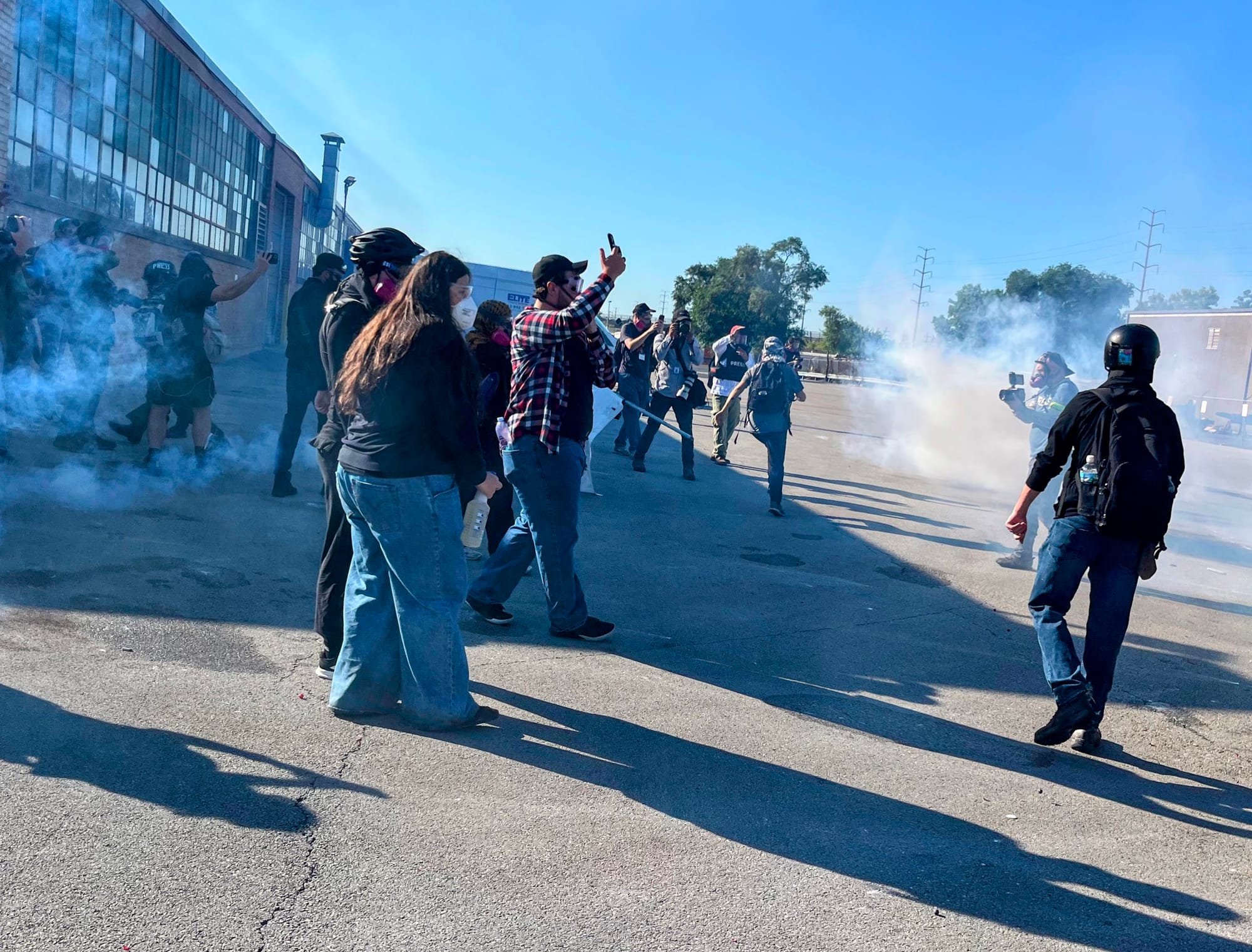 Protesters are attacked with tear gas.