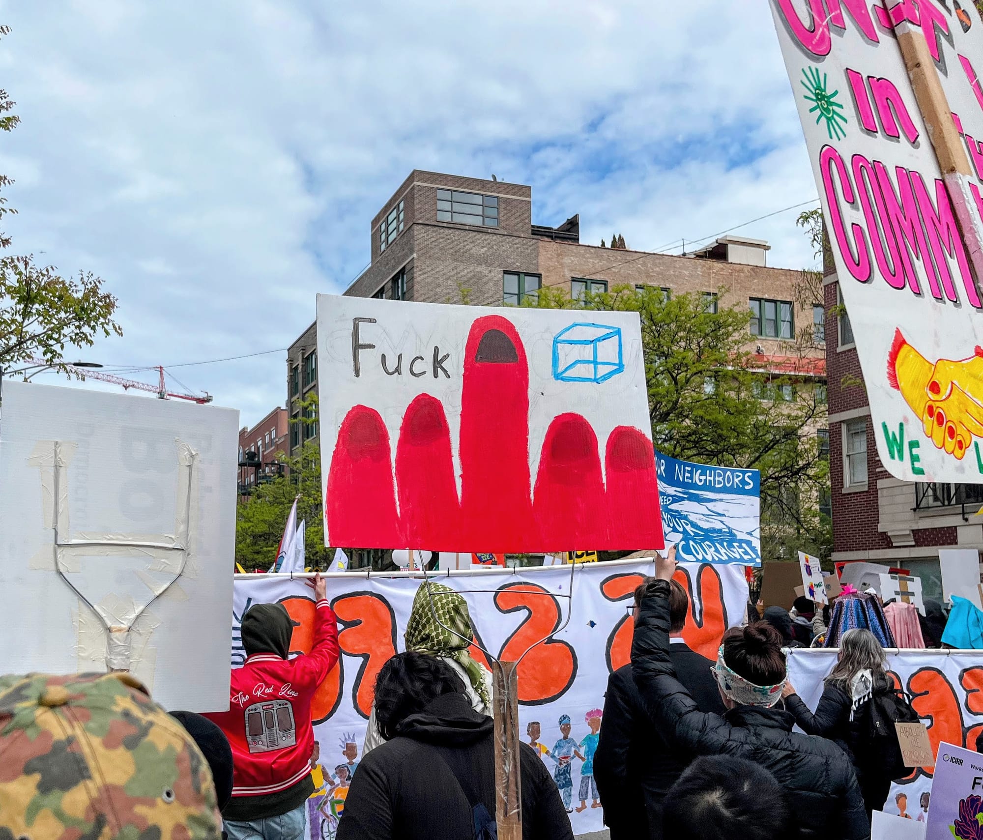An artful sign conveys the message "fuck ICE."