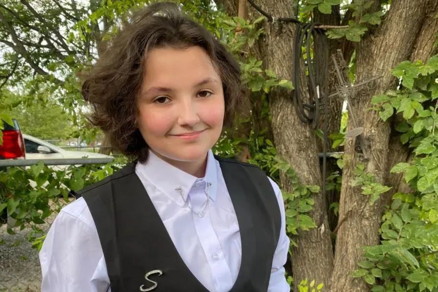 A photo of Nex Benedict, a non-binary tean with chin-length brown hair. They were a Native 16-year old.