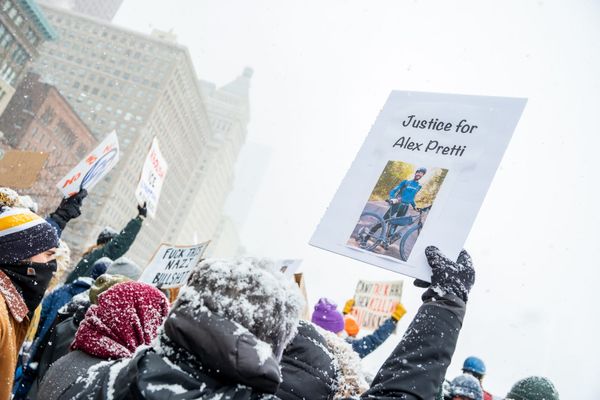 Snow-covered protesters in Chicago demand justice for Alex Pretti. 