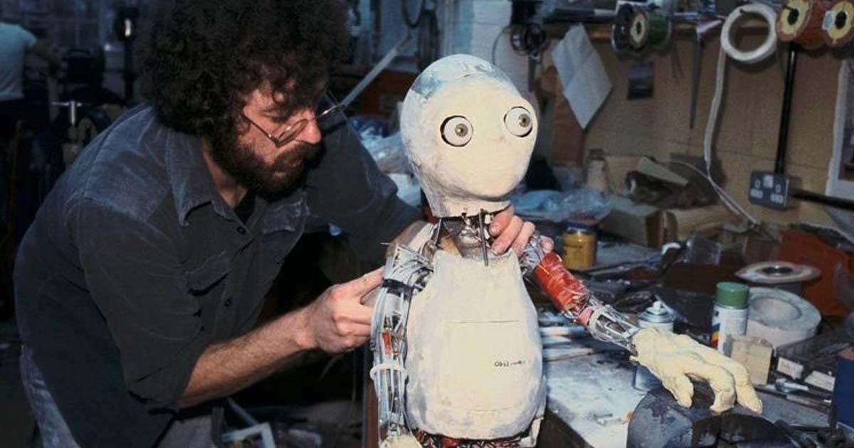 Unfinished Yoda puppet with exposed mechanics.
