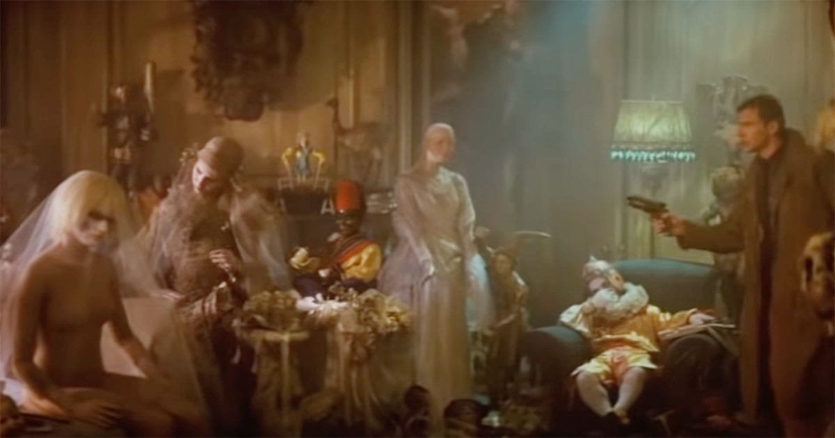 Deckard aims his weapon at Pris inside Sebastian’s apartment, surrounded by dolls.