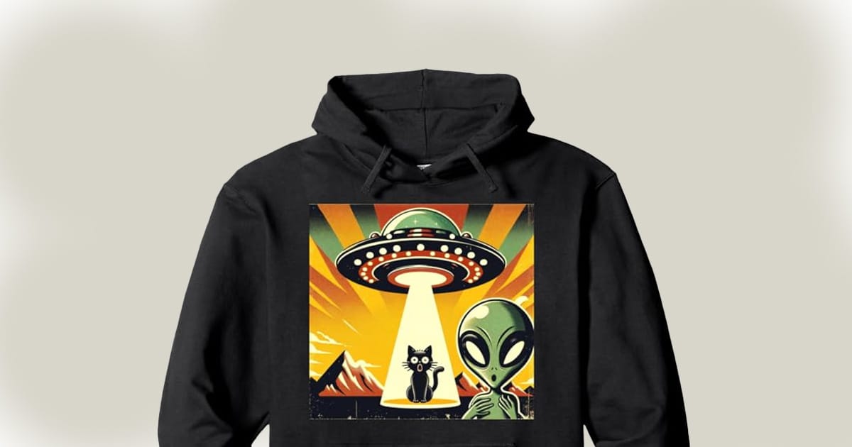 Hoodie showing UFO, Alien, and a cat.