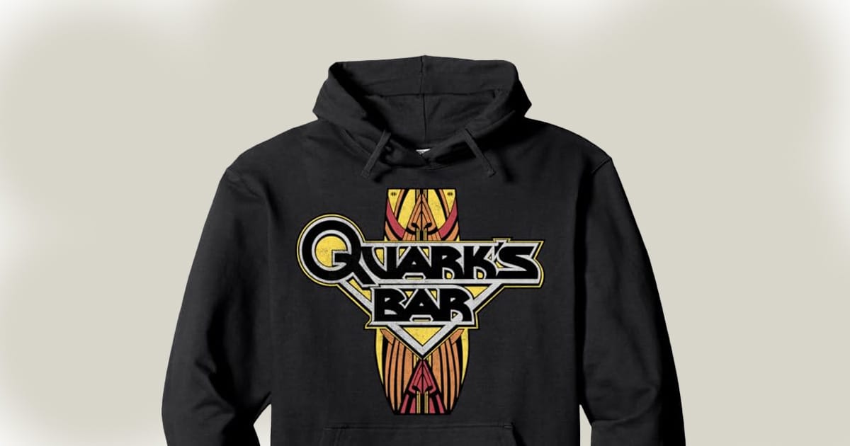 A black hoodie that has a logo for Quark's Bar from Star Trek.