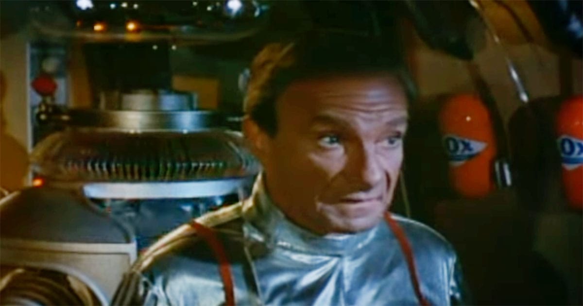 Jonathan Harris as Dr. Smith and Robot from "Lost in Space" TV show.