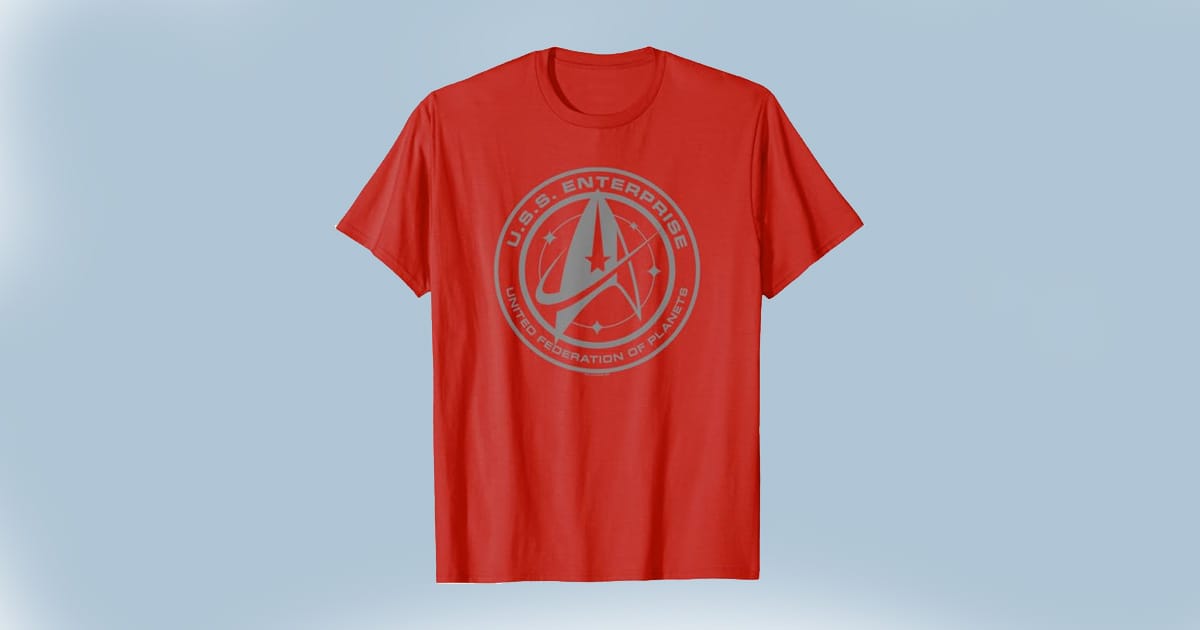 Red T-shirt featuring the U.S.S. Enterprise emblem—a bold uniform choice for anyone brave enough to beam down first.