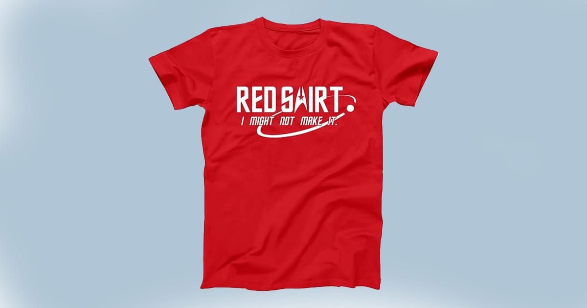 Red T-shirt with “Redshirt I Might Not Make It” in bold white text—a smart salute to the guys who beamed down and hoped for the best.