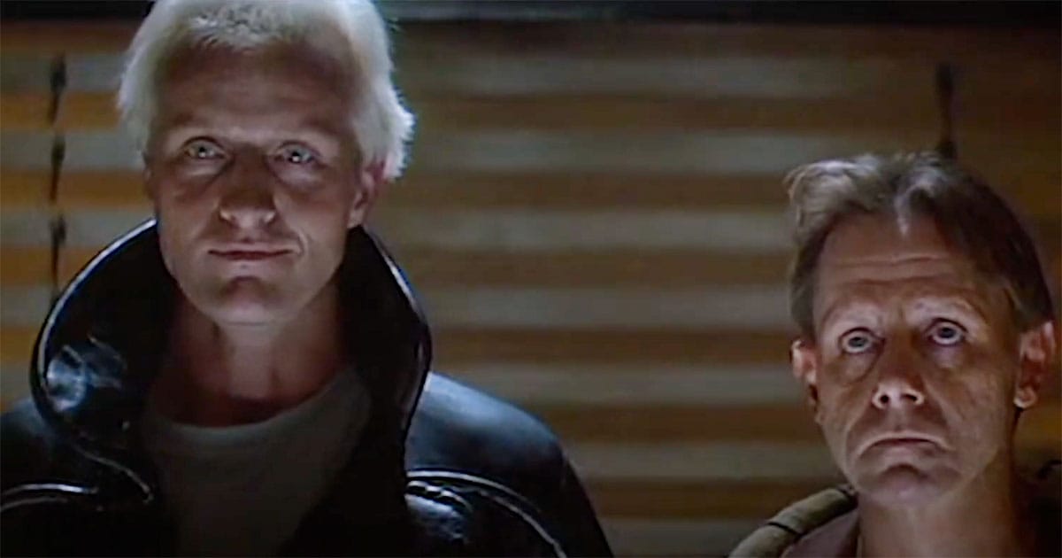Roy Batty and J.F. Sebastian standing side by side in a scene from "Blade Runner"