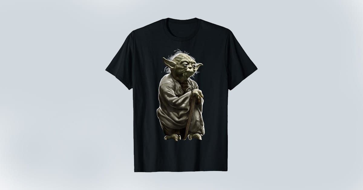 Black t-shirt featuring a detailed graphic of Yoda crouching with his cane, reflecting his thoughtful expression and wise presence.