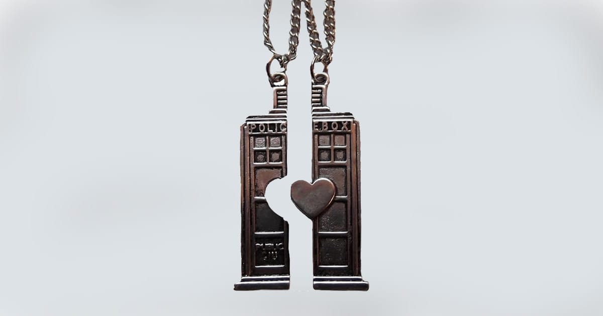 "Doctor Who" friendship necklace set with split TARDIS pendants forming a heart.