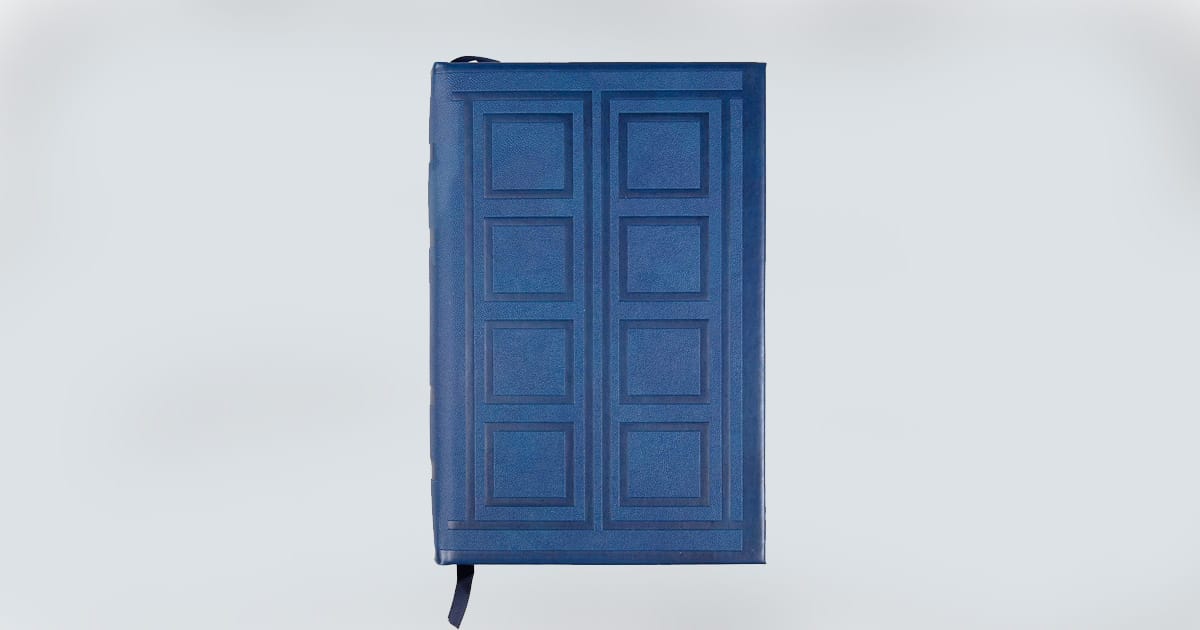 TARDIS-style "Doctor Who" journal with embossed blue cover and bookmark.