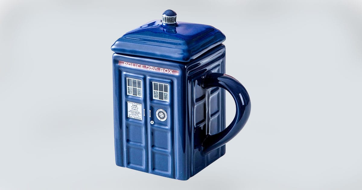 TARDIS-shaped ceramic mug from "Doctor Who" with lid and detailed police box design.